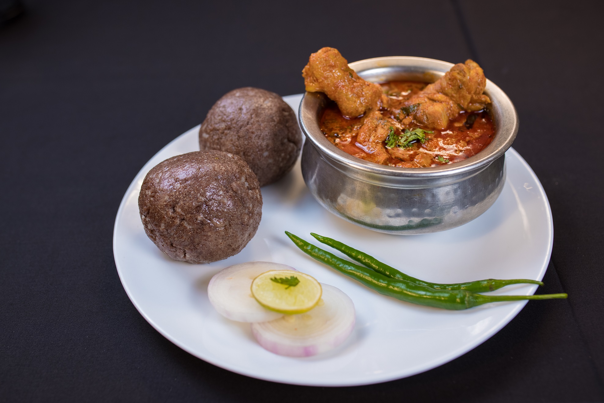 Ragi-Sangati-with-Natu-Kodi-Pulusu Natu Kodi Curry With Raagi Muddha