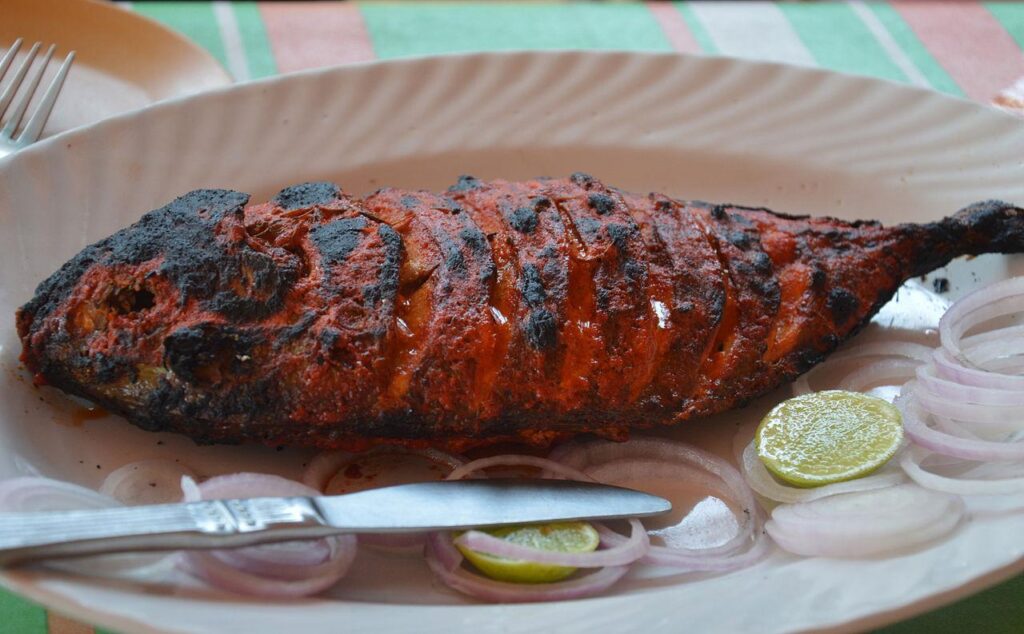 a plate of food with a knife and fork